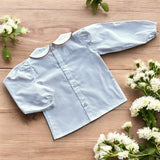 Camicia bianca con colletto alla bebè con profilo malva