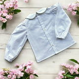 Camicia bianca con colletto alla bebè con profilo salvia