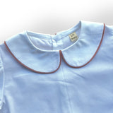 Camicia bianca con colletto alla bebè con profilo malva