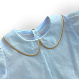 Camicia bianca con colletto alla bebè estiva con profilo ocra
